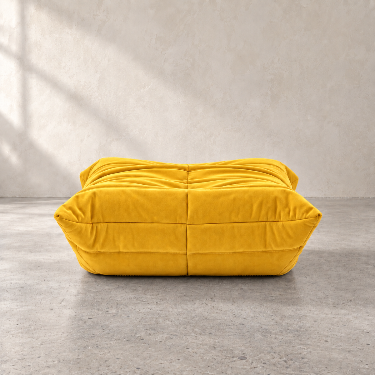 FORMA designer ottoman in yellow suede-look fabric