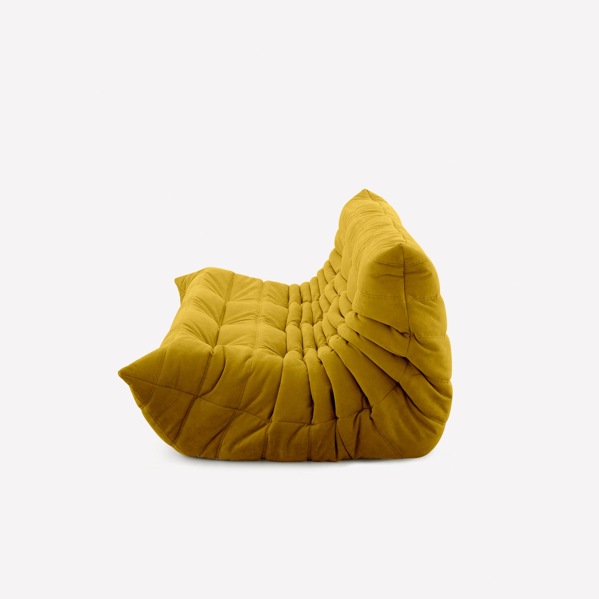 Large modern tufted sofa with sculpted channels and premium VeloraSuede fabric.