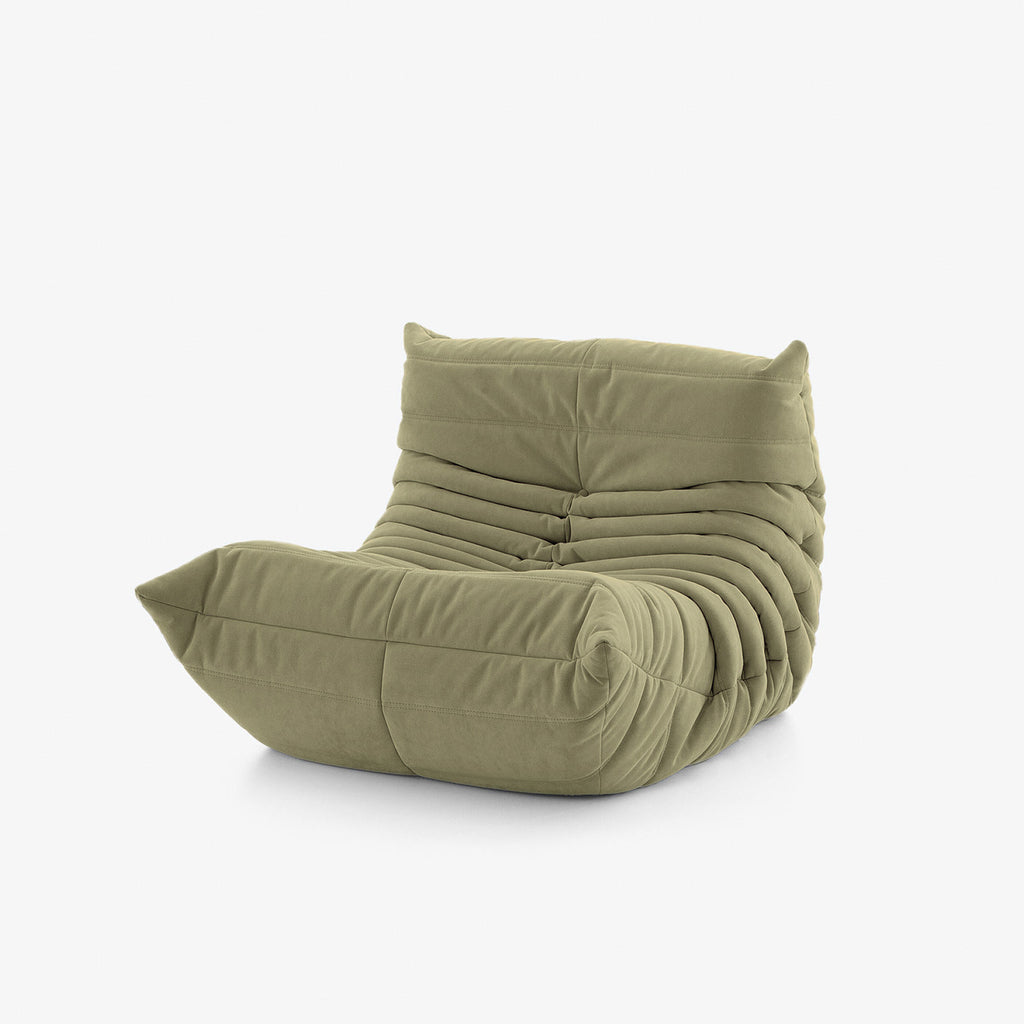 Modern armless lounge chair with deep channel tufting in VeloraSuede fabric.