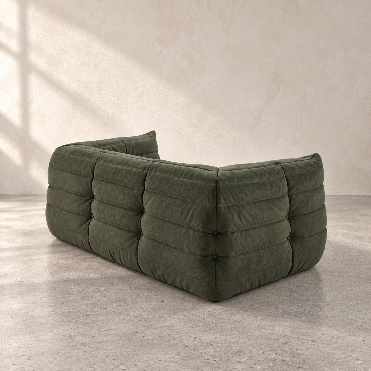 Olive green FORMA Lounge Sofa shown from the left three-quarter angle